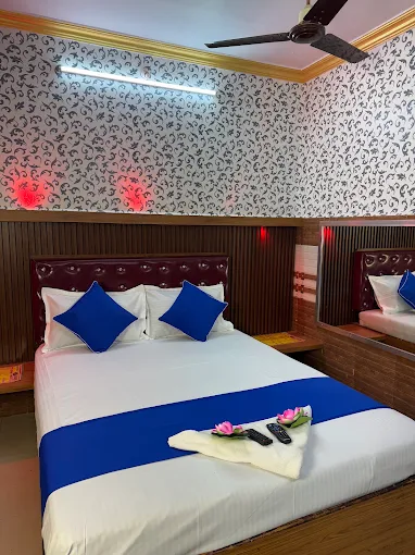 Bedroom with blue accents and double bed